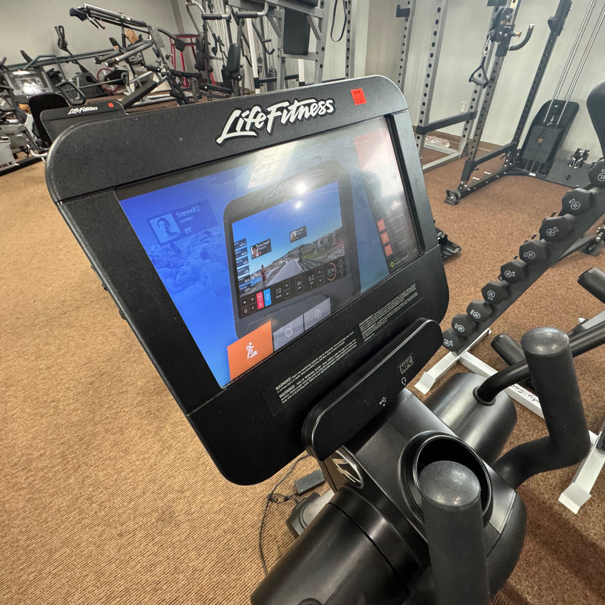 Life Fitness exercise bike console in a gym setting